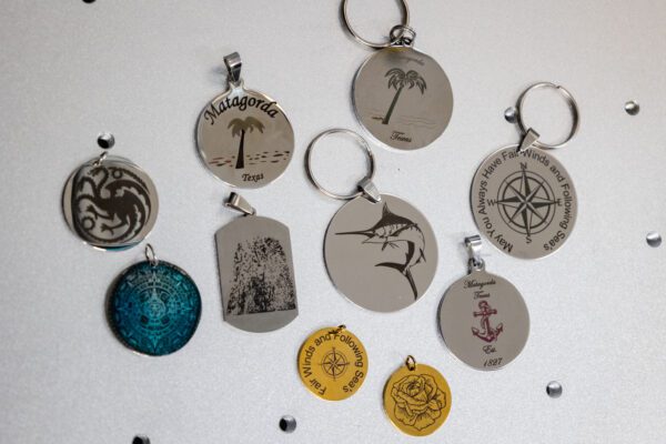 sland prints engraved on pendants