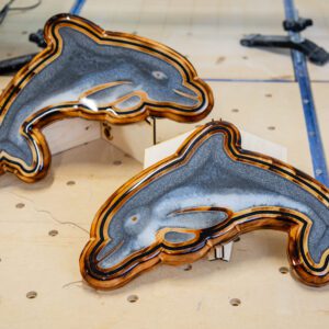 Dolphin carvings with laser engraving