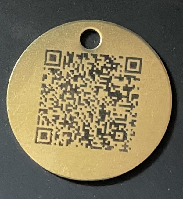 A QR code engraved on a pendant